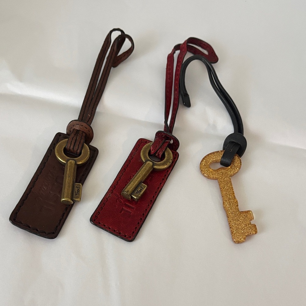 Lot of fossil fobs Brown and Red Leather Keychains with Gold Key Preowned